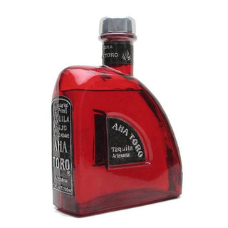 Aha Toro Artesanal Añejo Tequila 700ml, a red glass bottle with silver cap and labels, stands upright against a white background—offering rich, smooth vanilla caramel flavor in every sip.