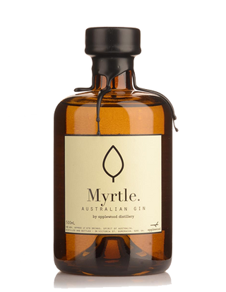 A brown glass bottle of Applewood Myrtle Gin features a black cap and cream label with a leaf logo, reflecting the gin’s botanical freshness and citrusy lemon myrtle notes.