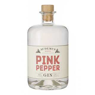 Audemus Pink Pepper Gin comes in a clear glass bottle with a wooden cork and white label, featuring bold red and black text. The gin highlights aromatic herbs and vibrant pink peppercorn spice.
