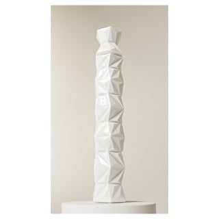 White abstract sculpture on a beige background