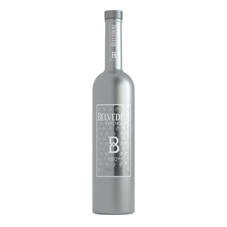 A metallic silver Belvedere Chrome Edition 700ml bottle with a geometric pattern and large B on the front stands upright on a plain white background, noted for its smooth palate and refined sweetness.