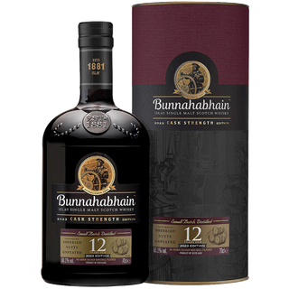 A bottle of Bunnahabhain 12 Year Old Cask Strength Single Malt Scotch Whisky stands beside its cylindrical box, both with dark labels and gold accents—inside are notes of creamy vanilla and cracked black pepper.