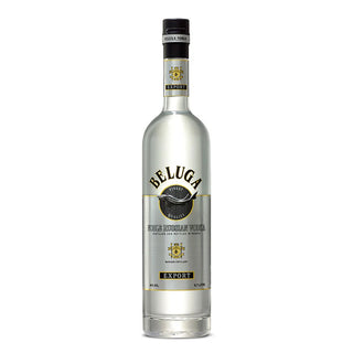 A 700ml clear glass bottle of Beluga Noble Russian Vodka stands upright against a white background, featuring silver and gold accents and a silver cap, renowned for its creamy texture and exceptionally smooth finish.