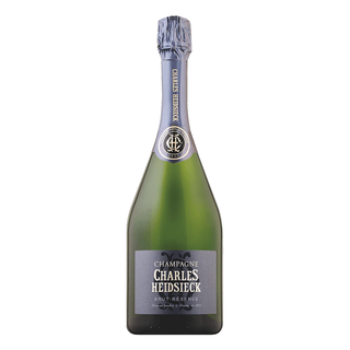 A 1.5L bottle of Charles Heidsieck Brut Réserve NV, featuring a gray label on green glass with a dark foil neck, displayed on white—celebrated for its fine bubbles and creamy texture.