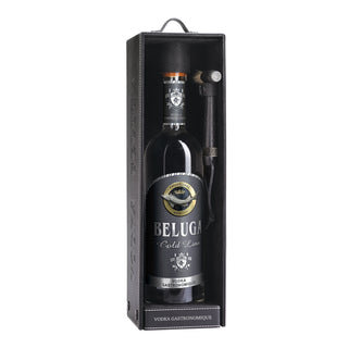 A 700ml bottle of Beluga Gold Line Vodka comes in a black gift box with a small metal hammer on the right, featuring "Vodka Gastronomique" on the packaging.