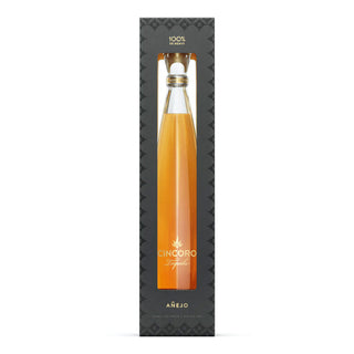 Cincoro Anejo Tequila 750ml comes in a tall, elegant bottle with amber liquid, showcased in a black box with a clear front. The label states Cincoro Tequila Añejo and 100% de agave—enjoy notes of caramelized agave and toasted oak.