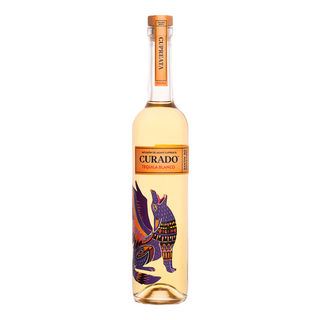 Curado Tequila Blanco - Infusión de Agave Cupreata 700ml comes in a tall, clear bottle with an orange label and a vibrant mythical creature design. Inside, enjoy notes of agave and citrus zest. The bottle is sealed with a wooden cork top.