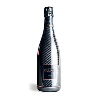 A bottle of Champagne Carbon Rose featuring a black, carbon fiber-textured exterior, foil-wrapped neck, and black label with the brand name; offers red fruit flavors and balanced acidity.