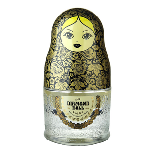 Diamond Doll Gold Russian Vodka 700ml comes in a clear bottle shaped like a matryoshka doll, featuring gold and black floral designs and a label on the front, offering smooth vodka with an elegant finish.