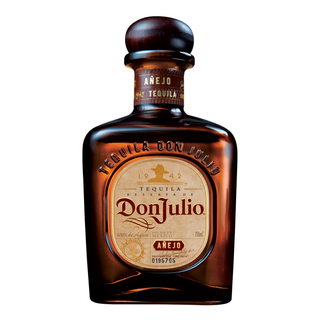 A 700ml bottle of Don Julio Anejo Tequila, featuring a brown cap and gold label with brand details, sits on a white background. Its dark glass hints at the rich vanilla and caramel agave notes within.