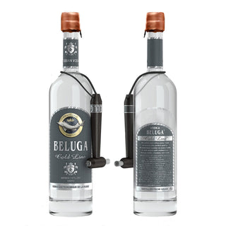 Two glass bottles of Beluga Gold Line Russian Vodka 1.5L, each with a copper-foiled neck, silver and gray labels, and a black stopper with metallic tube. Enjoy its smooth, creamy texture and subtle spice. Both front and back labels are shown.
