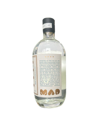 Clear bottle with a black cap on a white background