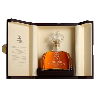 Gran Patron Burdeos Añejo Tequila 750ml comes in an elegant display case with cream lining and a pamphlet, featuring luxury packaging and offering sweet agave notes balanced by toasted oak.