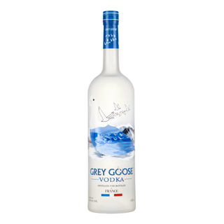 Grey Goose Vodka 4.5L comes in a tall, frosted glass bottle showcasing flying geese above blue mountains and a lake, with floral nuances and French flag colors on the label; it's crafted from winter wheat.