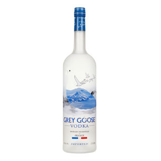 Grey Goose Vodka 1.75L comes in a frosted, tall bottle with blue mountains, flying geese, and the French flag on the label. Made from French winter wheat, it features a blue cap and offers floral notes for an exceptionally smooth taste.