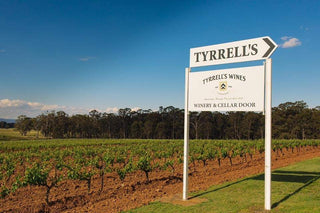 Tyrell's Wines sign in a vineyard with clear blue sky