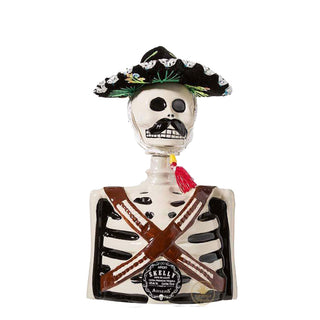 The Los Azulejos Pancho Villa Limited Edition Skelly Añejo Tequila 750ml features a ceramic skeleton figurine in a black sombrero and brown bandoliers, with a mustache and “Skelly” label, capturing the rich aroma of toasted oak in its unique design.