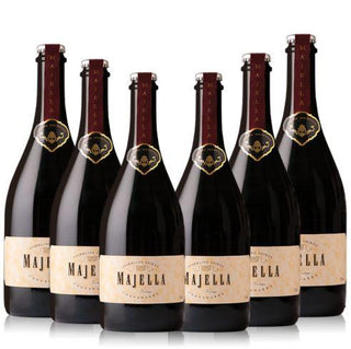 Six bottles of Majella Superiore Riserva DOCG wine arranged in a row against a white background.