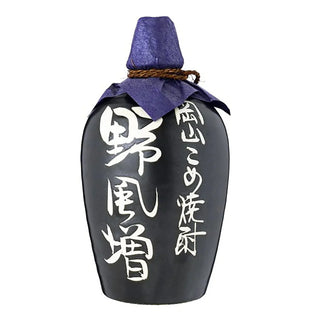 Black bottle with white text and a purple cap on a white background