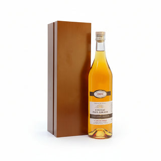 Bottle of Cognac Paul Giraud with a wooden box on a white background