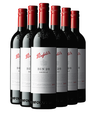 Penfolds Bin 28 Shiraz wine bottles on a white background
