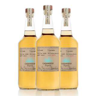 Three bottles of Casamigos Reposado Tequila 700ml stand side by side on a white background, highlighting handwritten-style labels and clear glass filled with light golden tequila featuring sweet agave and caramel notes.