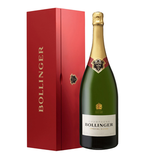 A 15L bottle of Bollinger Special Cuvée Brut NV stands beside an elegant red gift box with BOLLINGER in gold. The gold-foiled bottle features a white label and hints at brioche and toasted almond aromas.