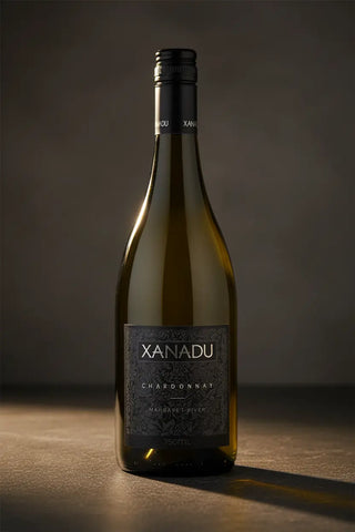 Wine bottle labeled 'Xanadu' on a dark background