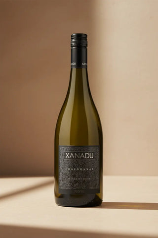 Xanadu wine bottle on a beige background
